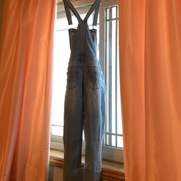 This is a Justice Romper/Jumpsuit, has sequence for holes. - Picture 5 of 6